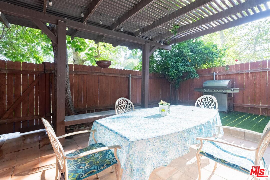 2567 Grambling Lane Riverside, CA 92507 - Photo 29 of 38 a table and chairs in the patio