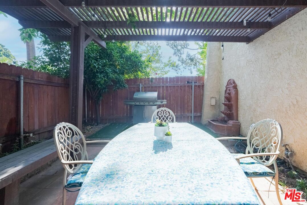 2567 Grambling Lane Riverside, CA 92507 - Photo 30 of 38 a table and chairs in patio