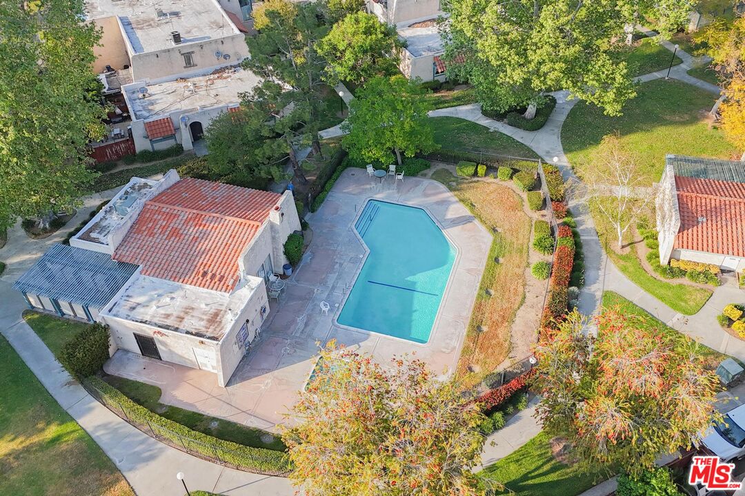 2567 Grambling Lane Riverside, CA 92507 - Photo 32 of 38 an aerial view of a house with a yard and trees