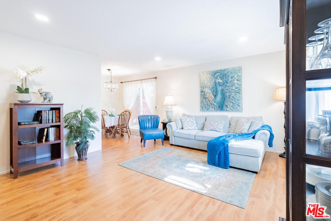 2567 Grambling Lane Riverside, CA 92507 - Photo 8 of 38 a living room with furniture and wooden floor