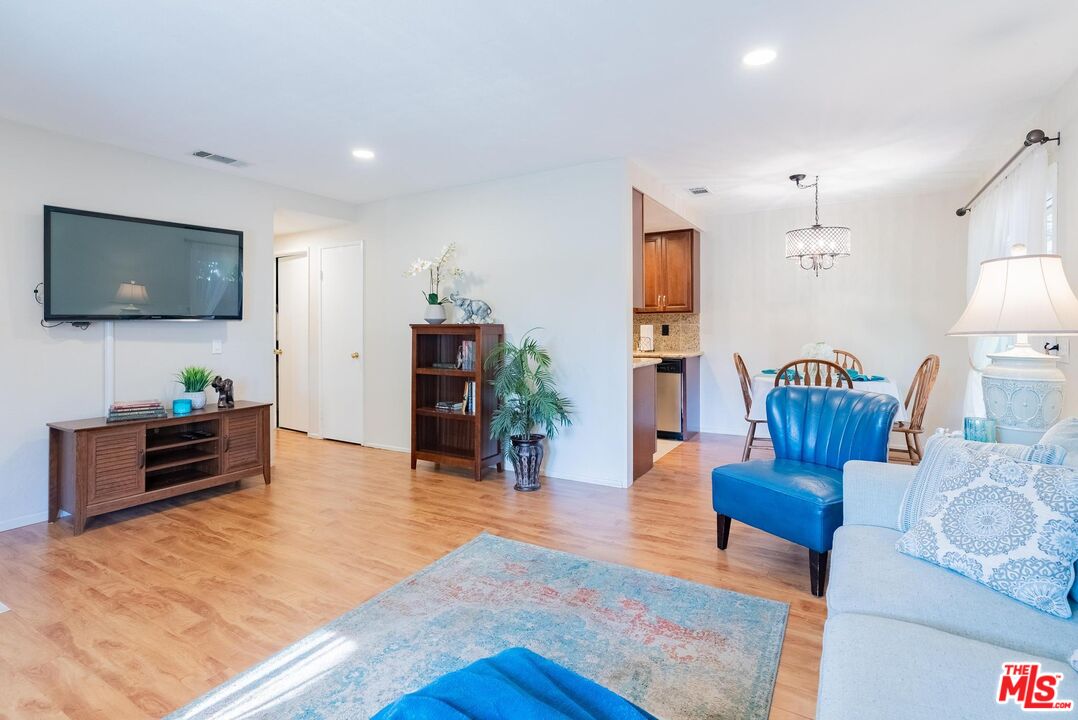 2567 Grambling Lane Riverside, CA 92507 - Photo 10 of 38 a living room with furniture and a flat screen tv