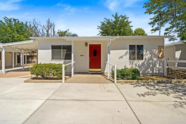 front view of a house with a patio