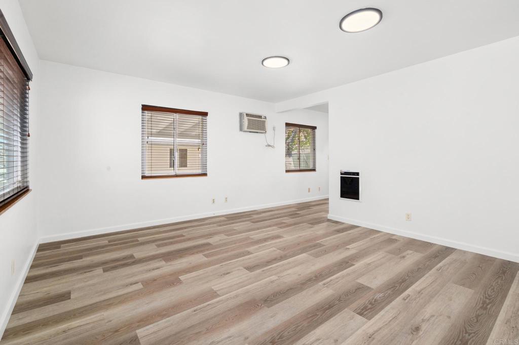 549 D Street Ramona, CA 92065 - Photo 21 of 44 a view of empty room with wooden floor