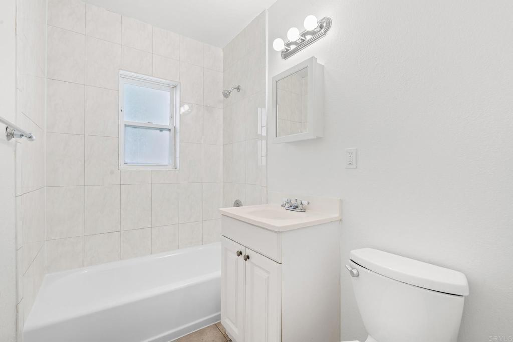 549 D Street Ramona, CA 92065 - Photo 34 of 44 a bathroom with a sink a toilet and shower