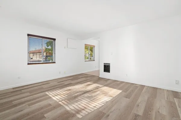 a view of an empty room and window