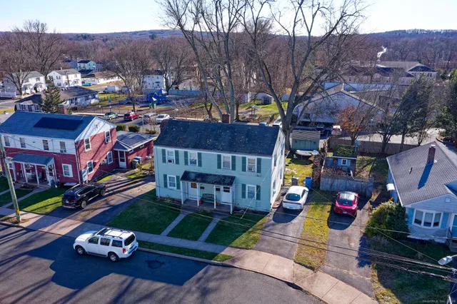 a front view of a building with outdoor space