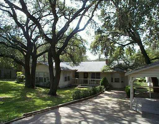 2214 Bahama Road Austin, TX 78733 - Photo 1 of 1 a front view of a house with a yard