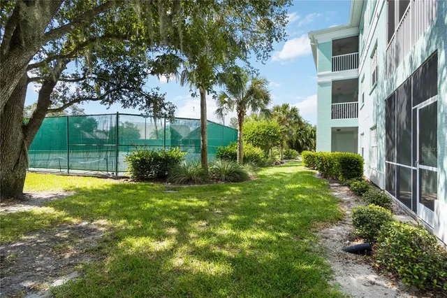 a view of backyard with garden and plants