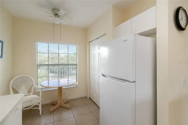 a spacious bedroom with a bed and a window