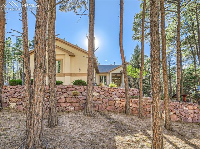 17794 Sawmill Road Colorado Springs, CO 80908 - Photo 2 of 29 Front of the Home