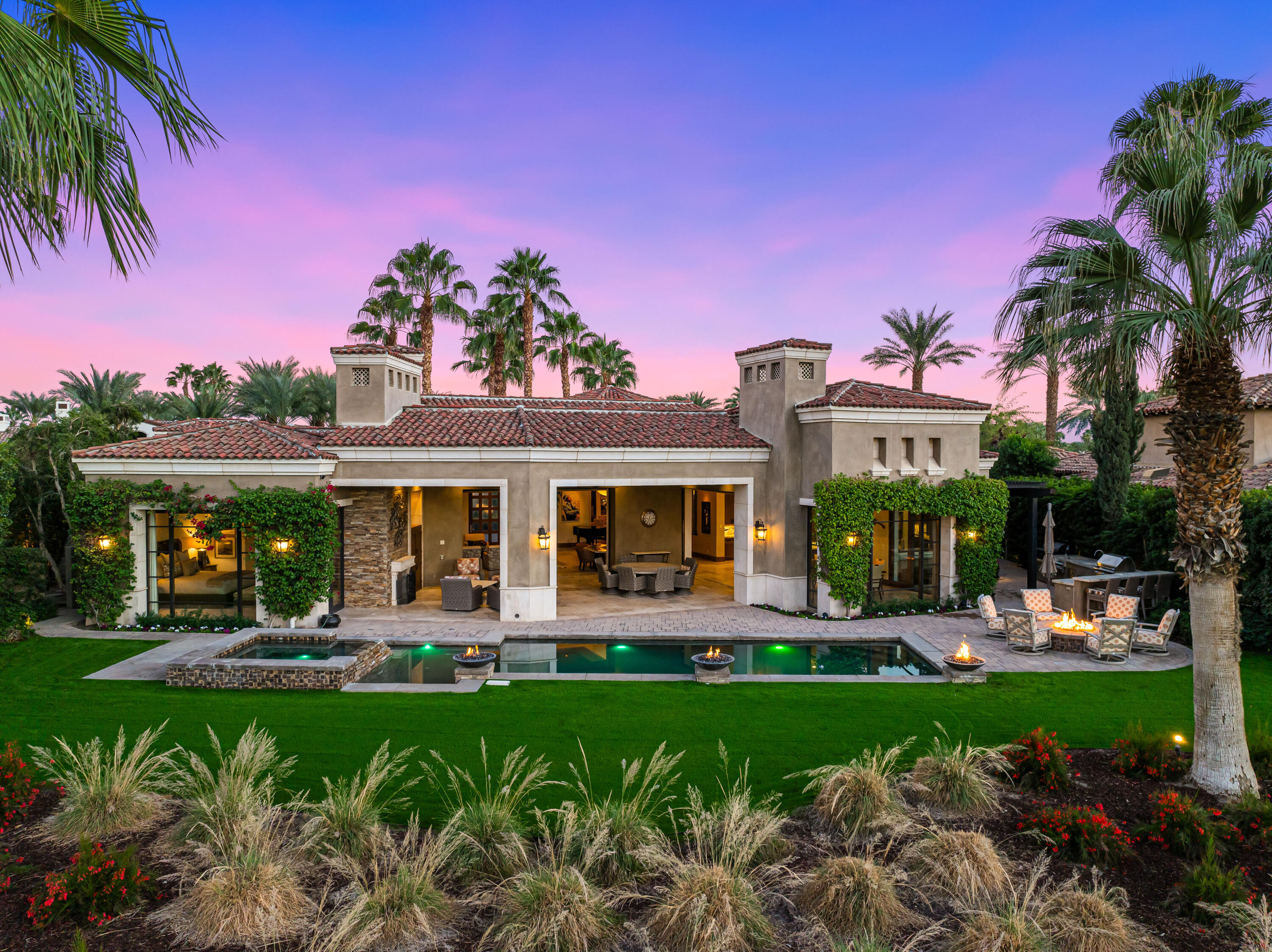 52711 Via Dona La Quinta, CA 92253 - Photo 1 of 61 a front view of a house with garden and sitting area