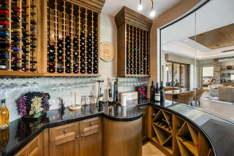 a kitchen with stainless steel appliances granite countertop a stove and a sink