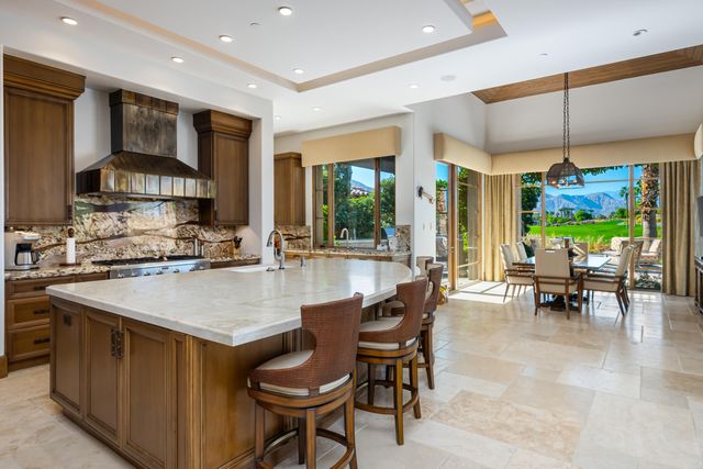 a kitchen with a stove and a microwave