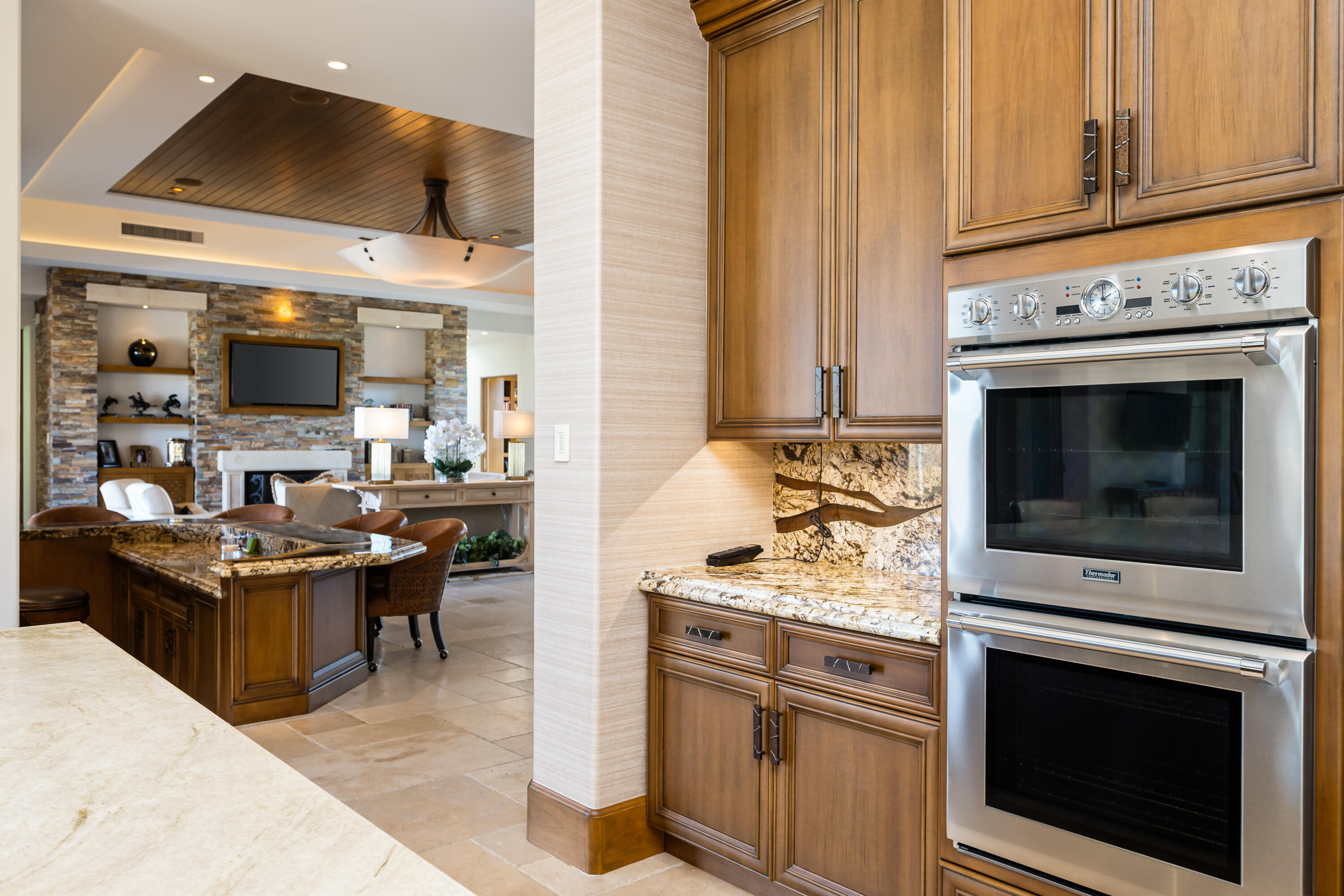 52711 Via Dona La Quinta, CA 92253 - Photo 17 of 61 a kitchen with a stove and a microwave