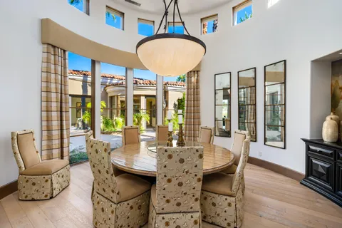 a bedroom with a bed and a flat tv screen