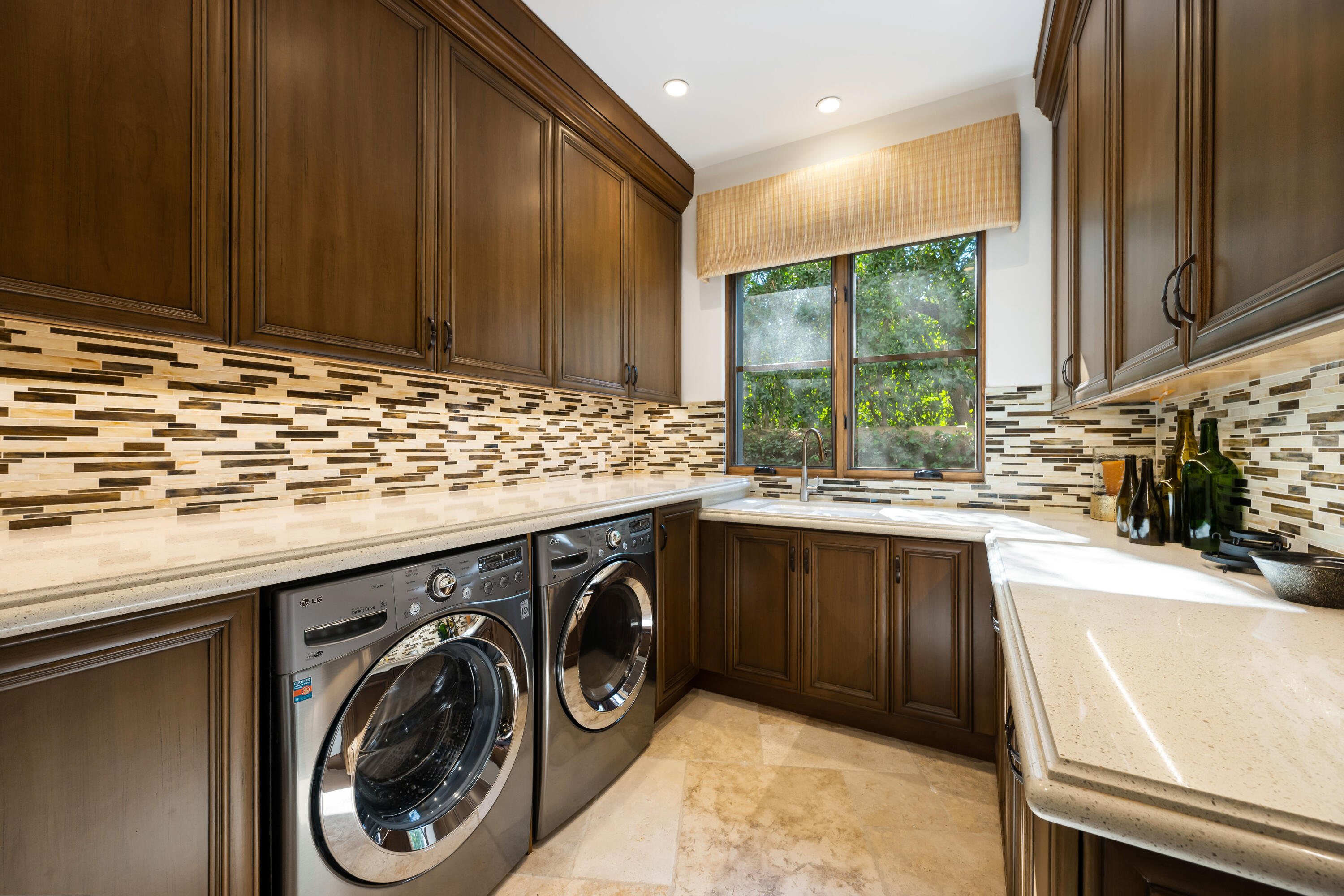 52711 Via Dona La Quinta, CA 92253 - Photo 27 of 61 a kitchen with a sink and a stove top oven