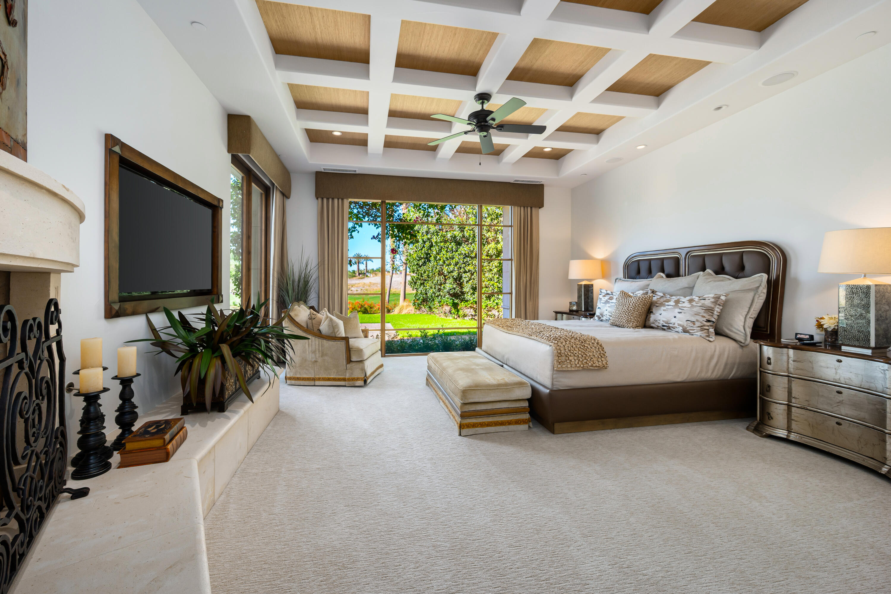 52711 Via Dona La Quinta, CA 92253 - Photo 28 of 61 a bedroom with a bed and a flat tv screen