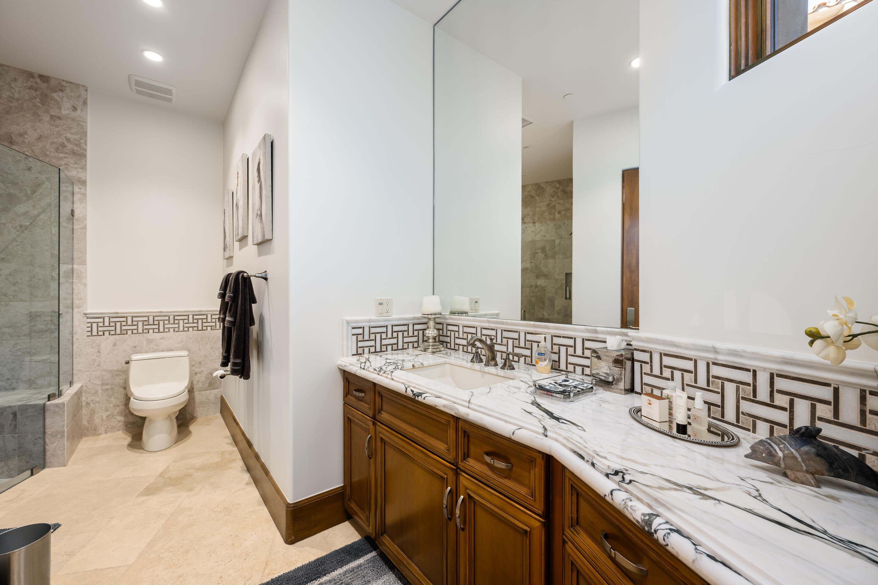 52711 Via Dona La Quinta, CA 92253 - Photo 36 of 61 a bathroom with a sink double vanity and a toilet