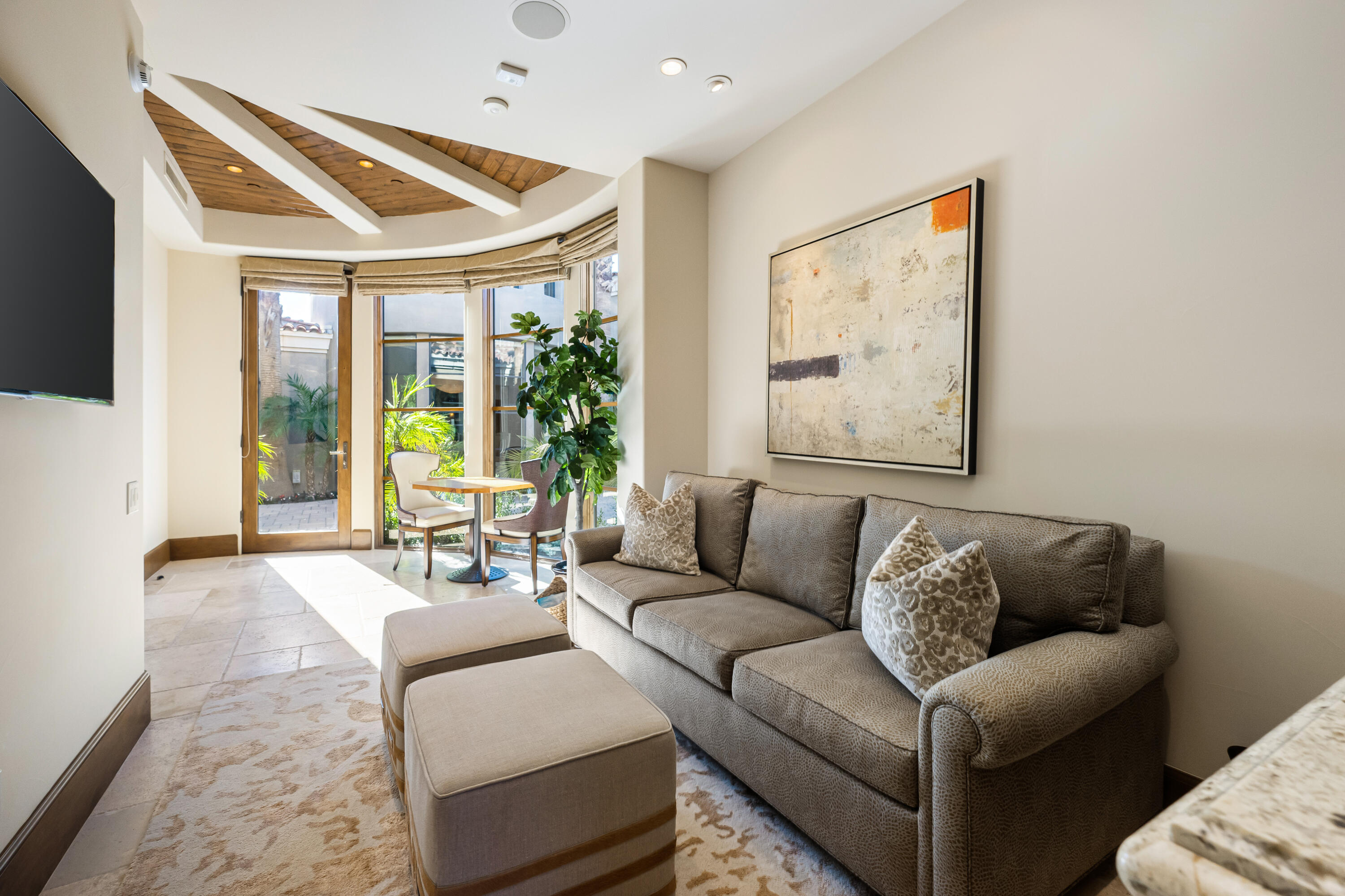 52711 Via Dona La Quinta, CA 92253 - Photo 40 of 61 a living room with furniture and a large window