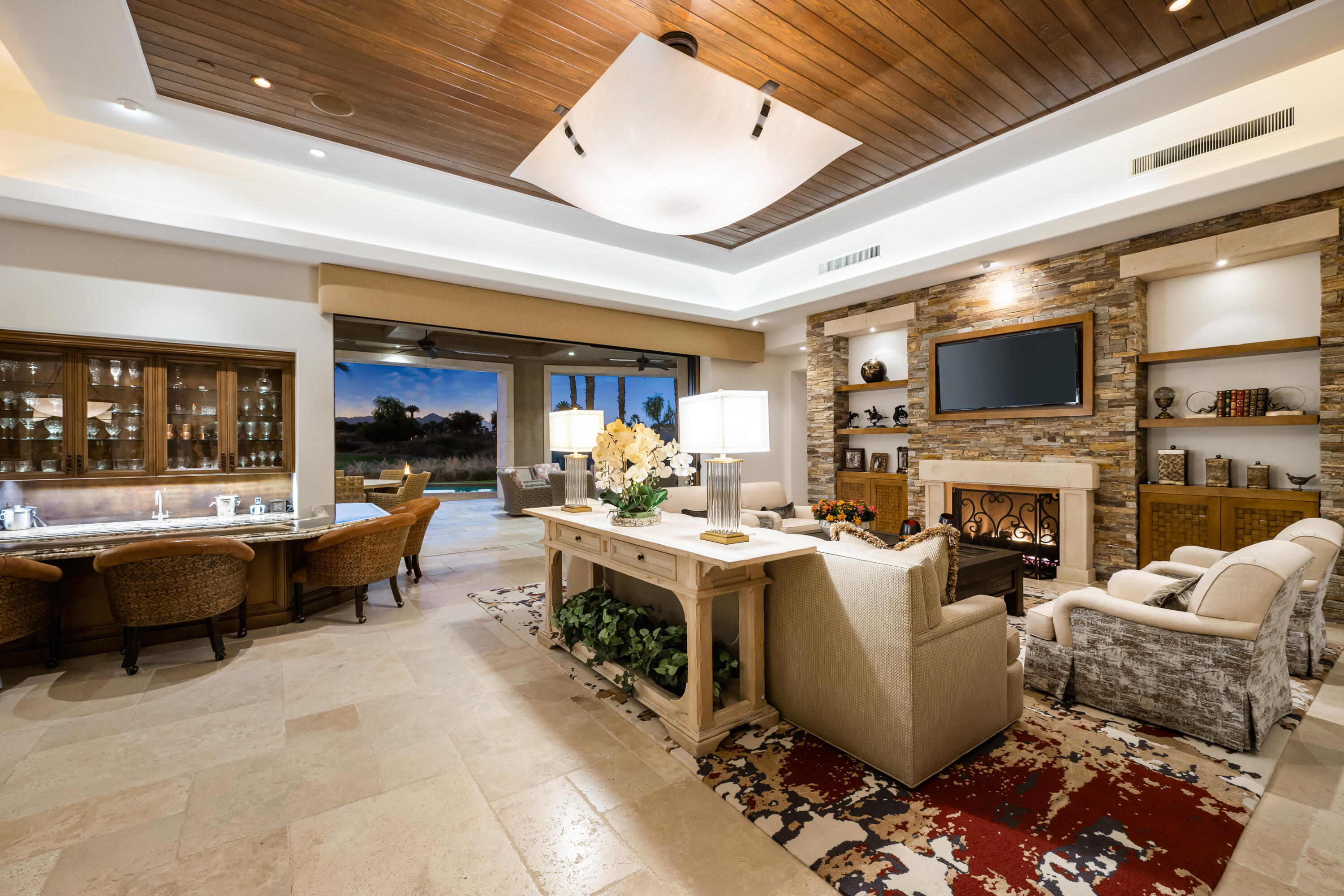 52711 Via Dona La Quinta, CA 92253 - Photo 48 of 61 a living room with fireplace furniture and a large window