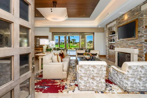 a living room with furniture or fireplace and a flat screen tv