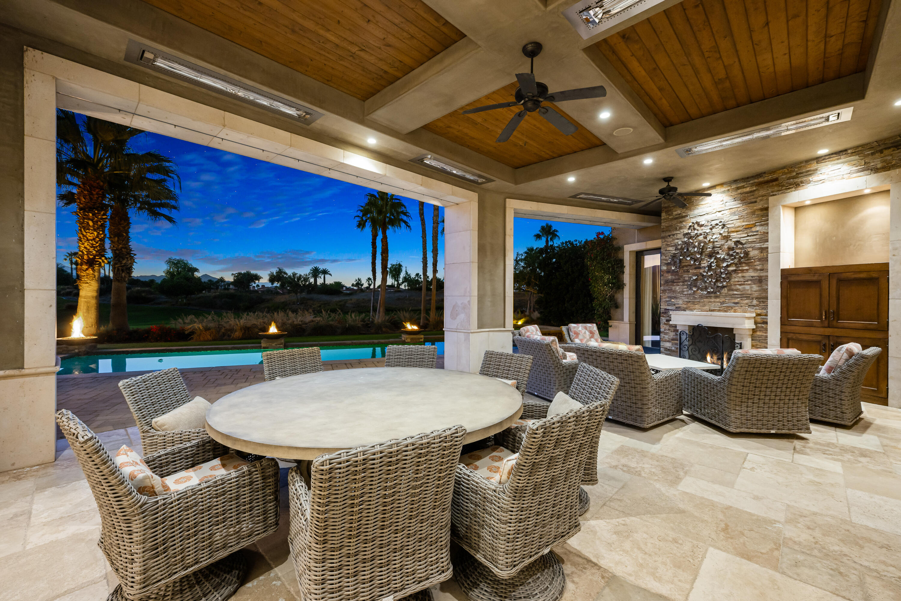 52711 Via Dona La Quinta, CA 92253 - Photo 52 of 61 a outdoor space with patio furniture and a fireplace