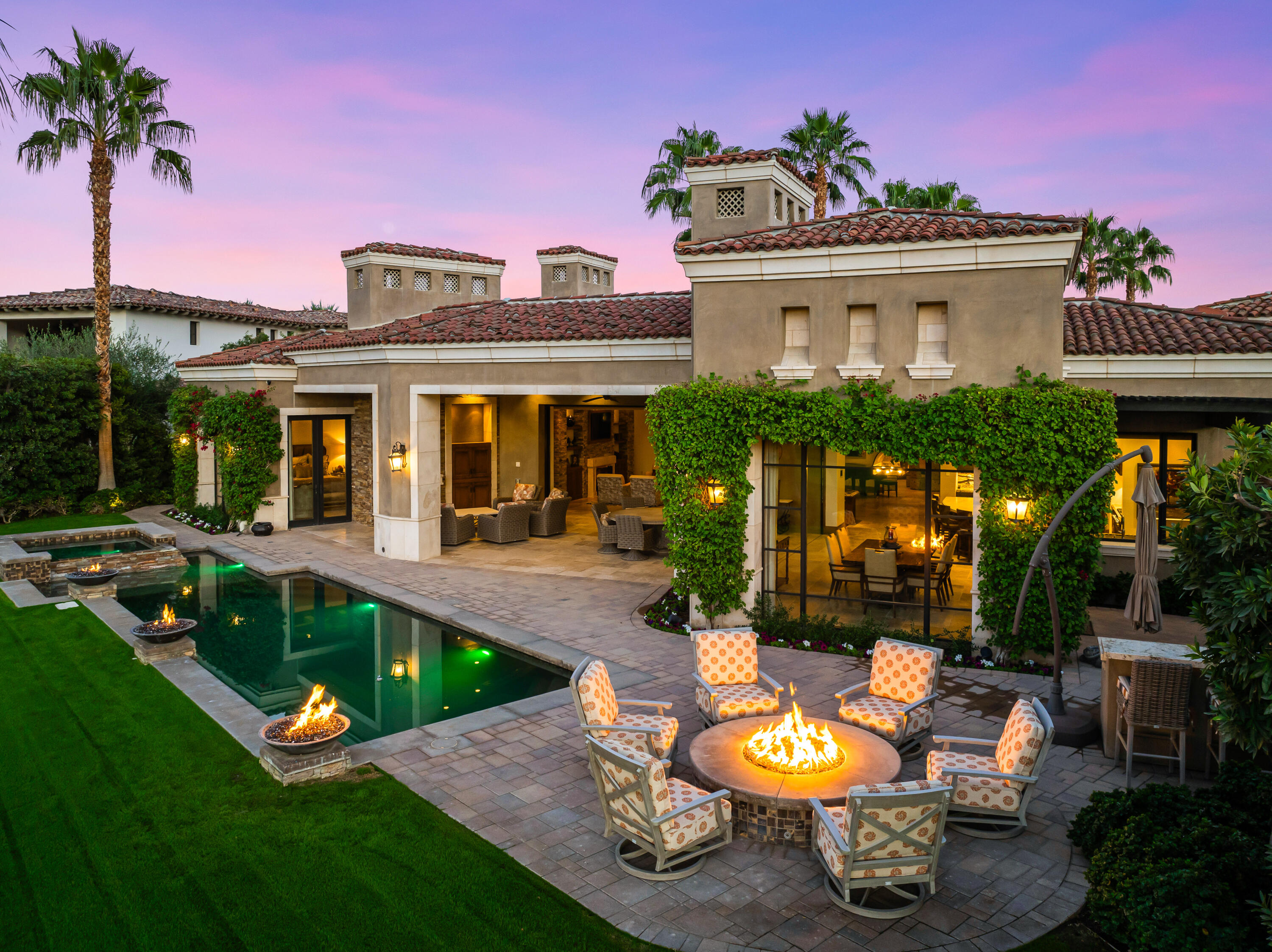 52711 Via Dona La Quinta, CA 92253 - Photo 55 of 61 a view of a house with backyard outdoor seating area and swimming pool
