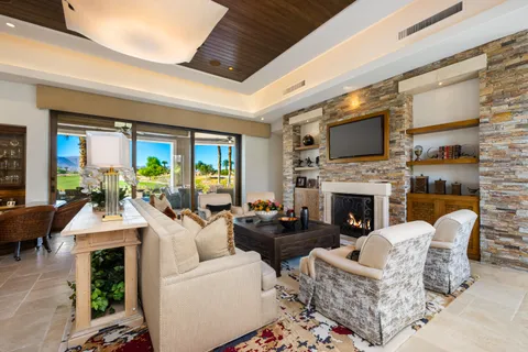 a kitchen with stainless steel appliances granite countertop a sink and a counter top space