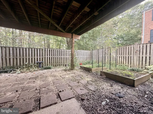 a view of a backyard with a small cabin