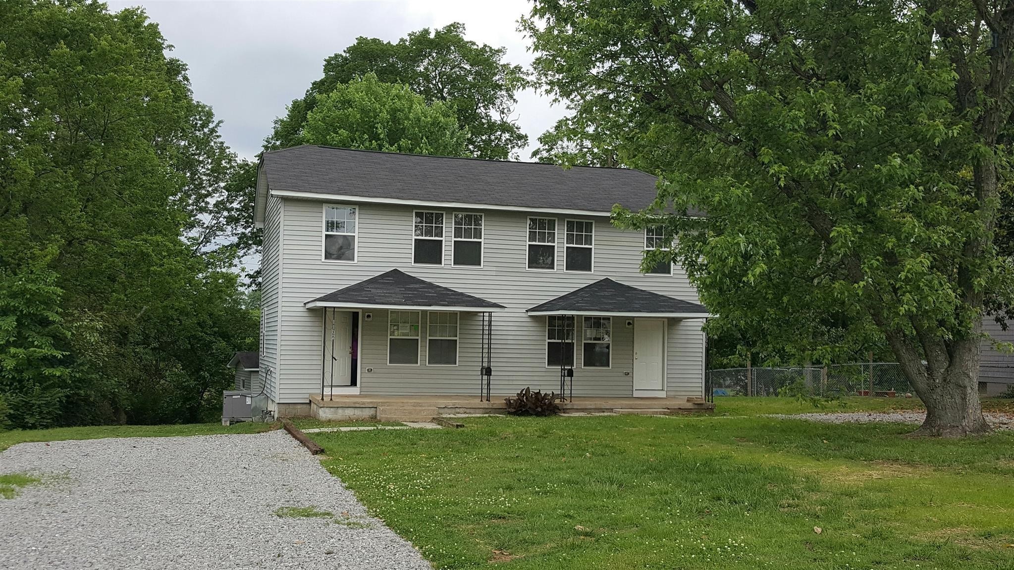 1102 Fowler Street Old Hickory, TN 37138 - Photo 1 of 13 front view of a house and a yard