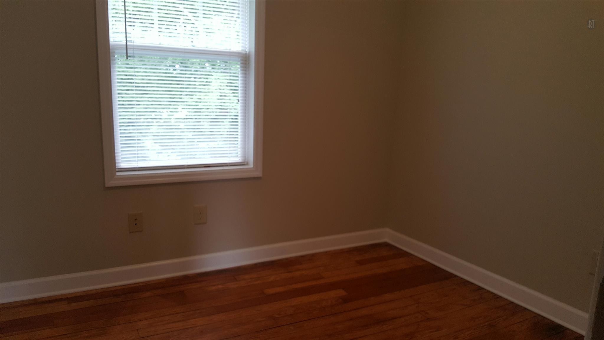 1102 Fowler Street Old Hickory, TN 37138 - Photo 13 of 13 a view of a small space with wooden floor and a window