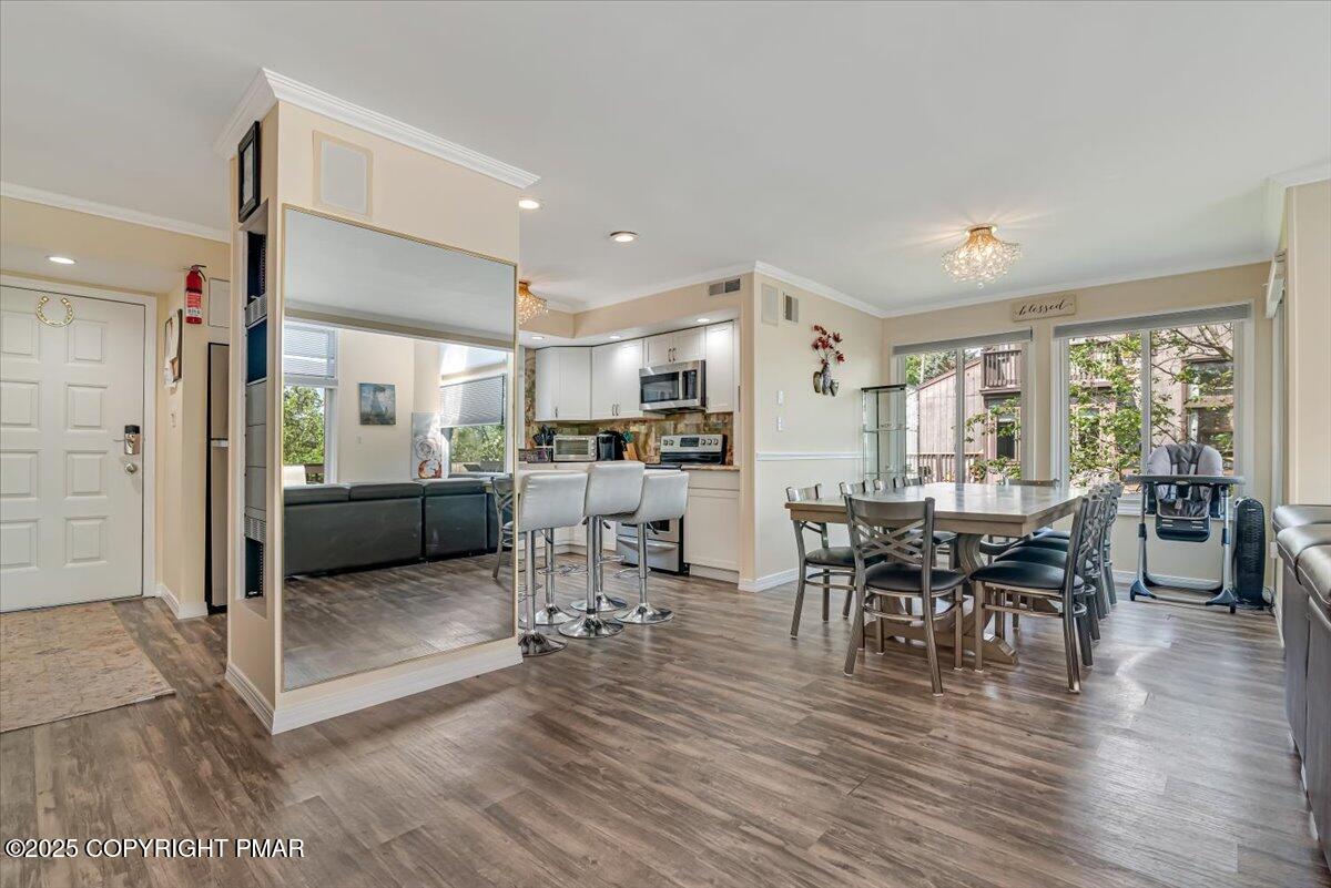 268 Big Pocono Pass Tannersville, PA 18372 - Photo 15 of 66 a living room with furniture wooden floor and a large window