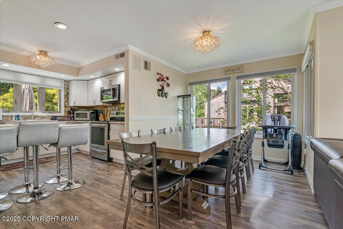 268 Big Pocono Pass Tannersville, PA 18372 - Photo 16 of 66 a view of a dining room with furniture window and outside view