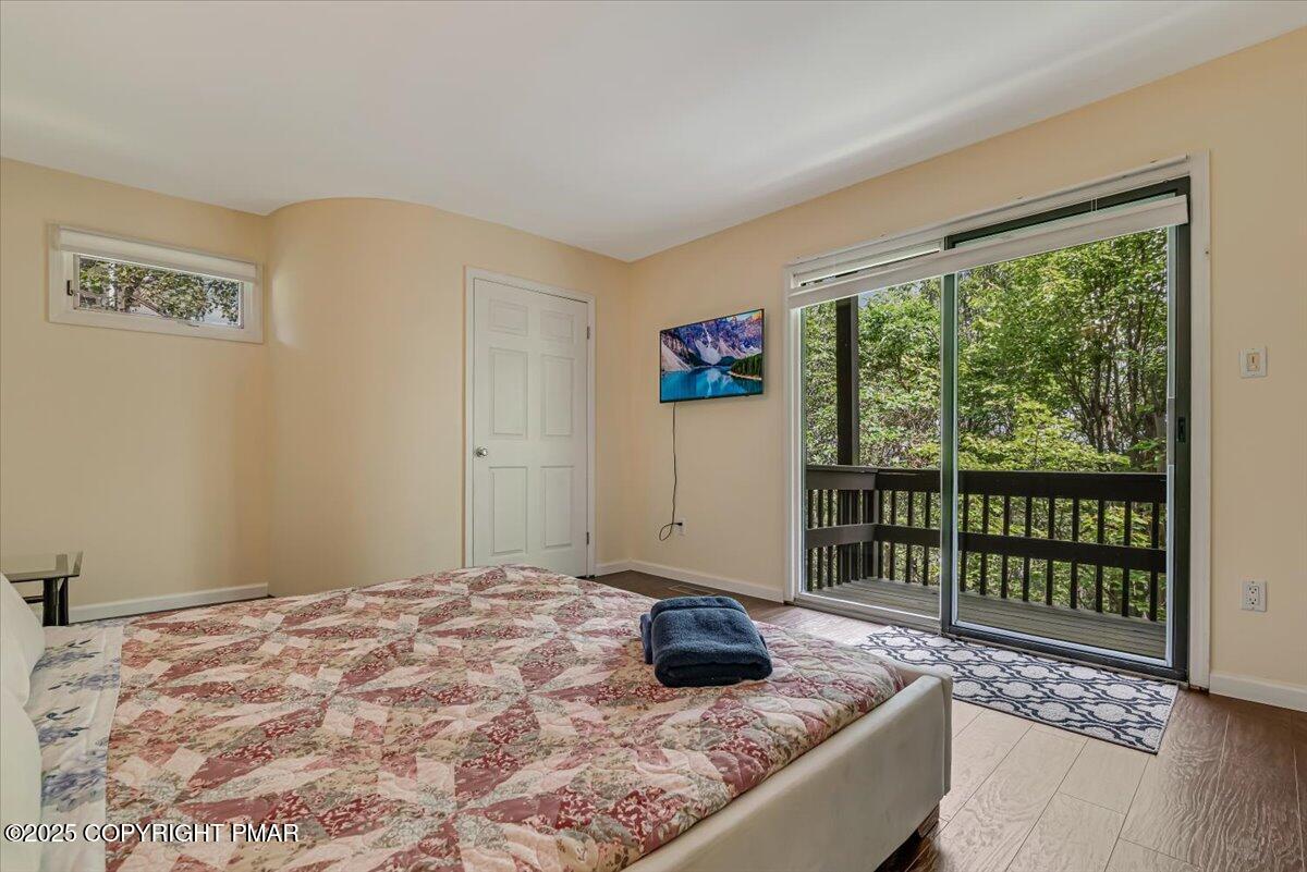 268 Big Pocono Pass Tannersville, PA 18372 - Photo 38 of 66 a bedroom with a bed and a window