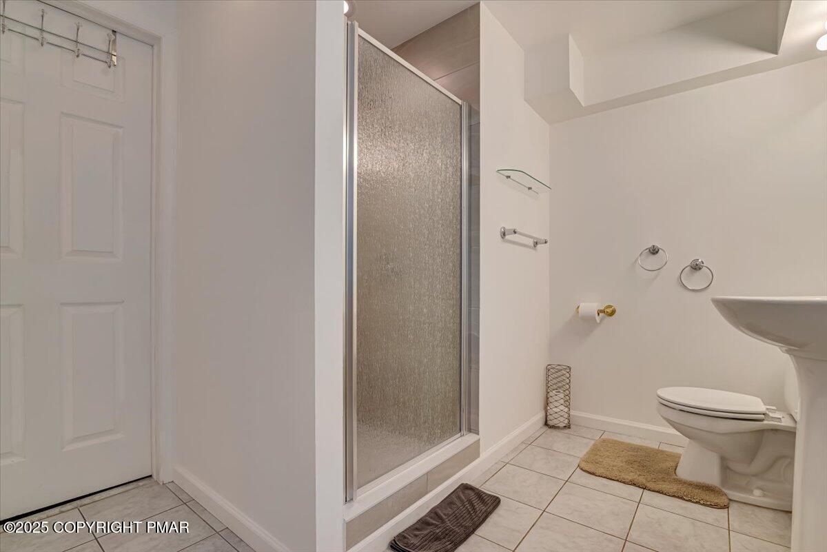 268 Big Pocono Pass Tannersville, PA 18372 - Photo 46 of 66 a bathroom with a toilet and a shower