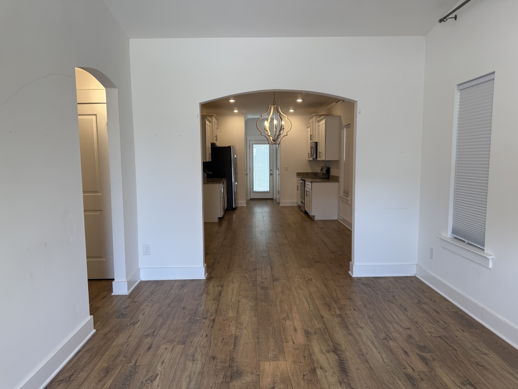 400 Buchanan Court Columbia, TN 38401 - Photo 5 of 21 a view of a room with wooden floor staircase and a hallway