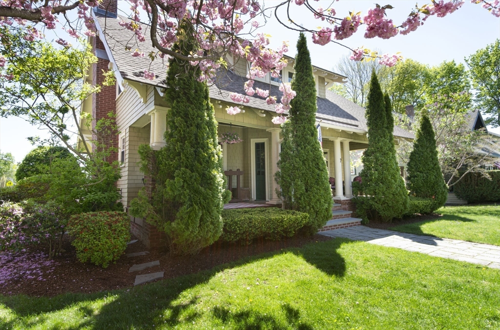 7 Greenleaf Terrace Worcester, MA 01602 - Photo 3 of 42 a view of a brick house with a big yard and large trees
