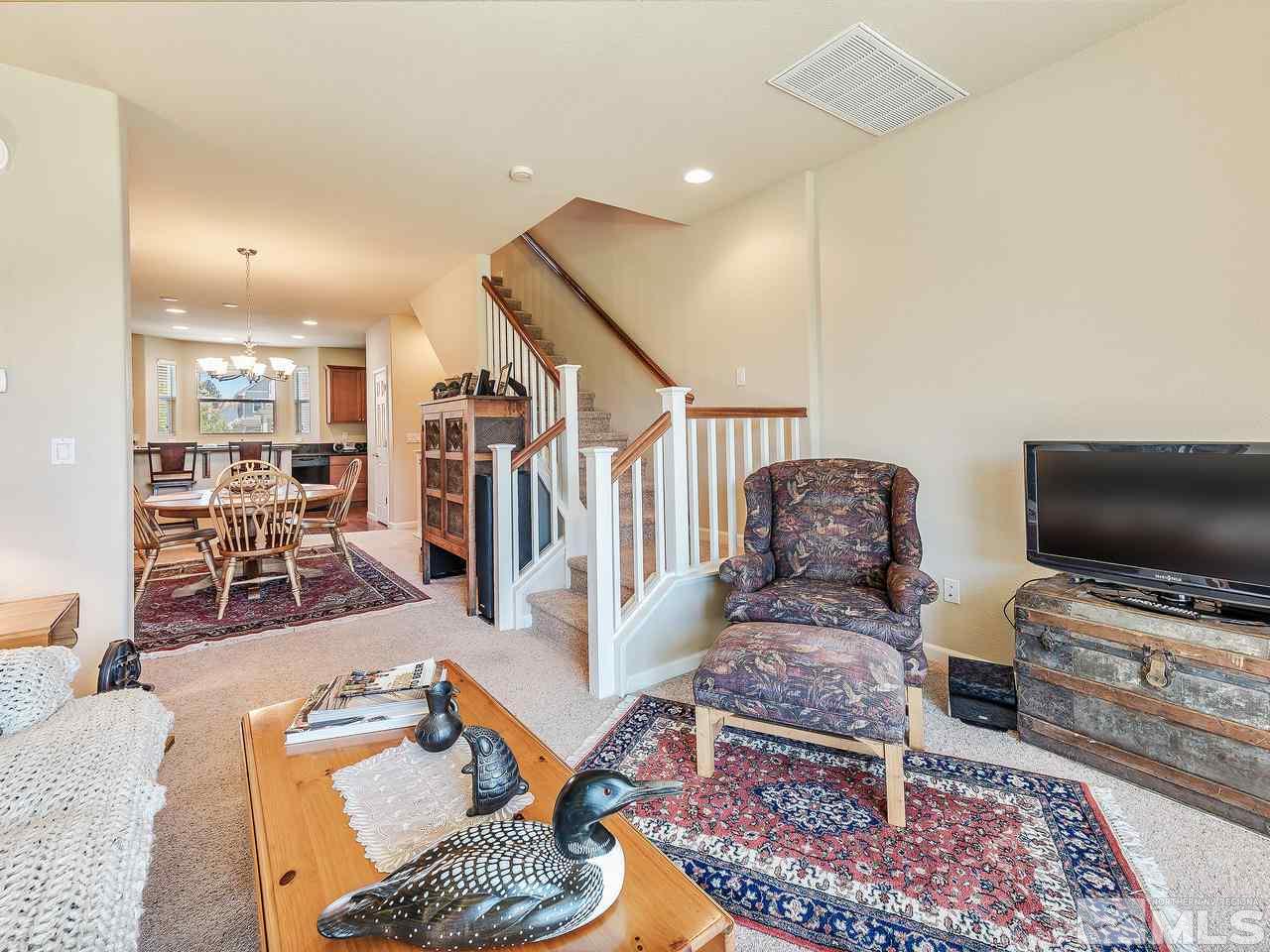 240 Gramercy Lane Reno, NV 89509 - Photo 11 of 18 a living room with furniture and a flat screen tv