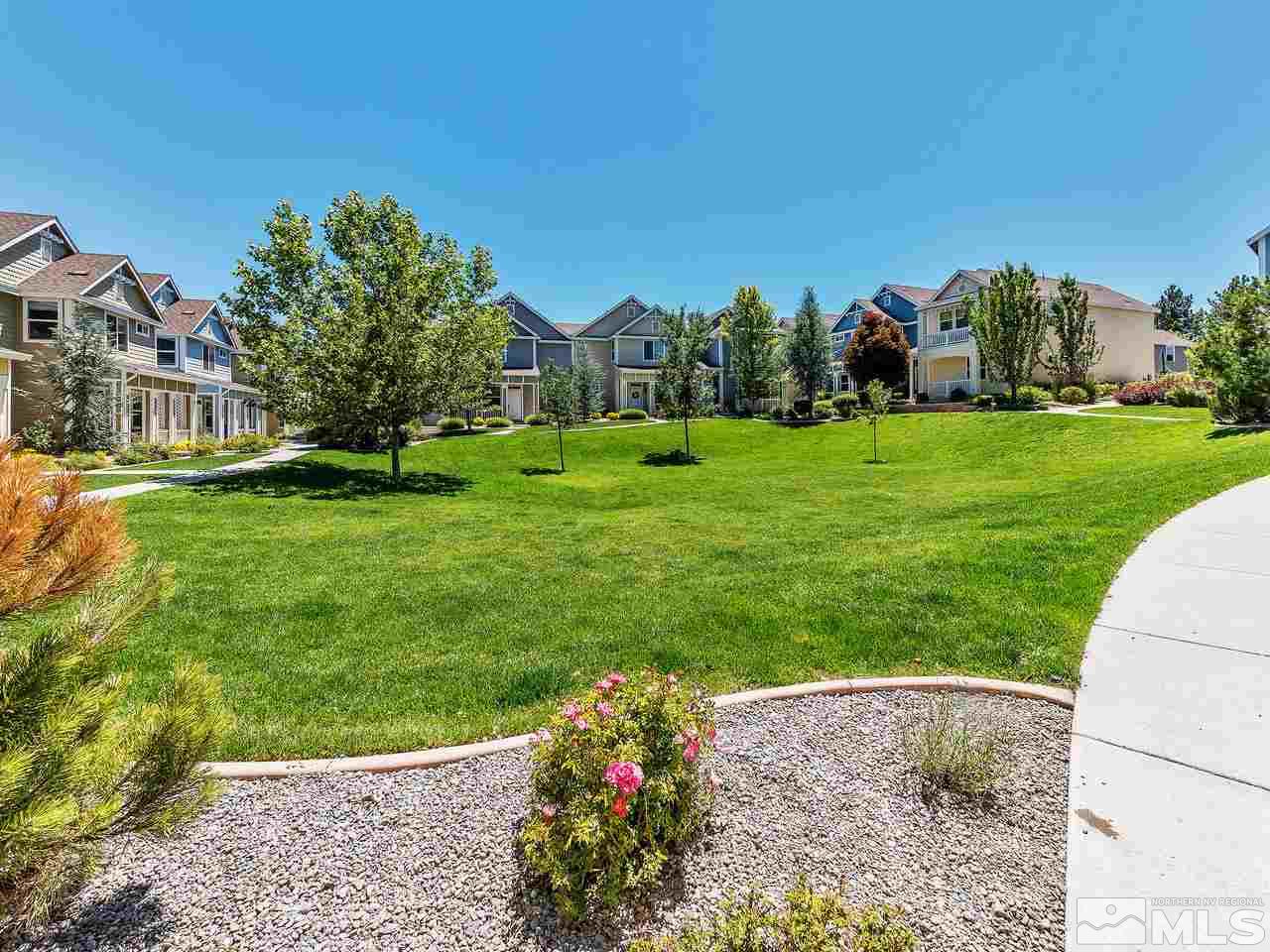 240 Gramercy Lane Reno, NV 89509 - Photo 4 of 18 a front view of a house with a yard