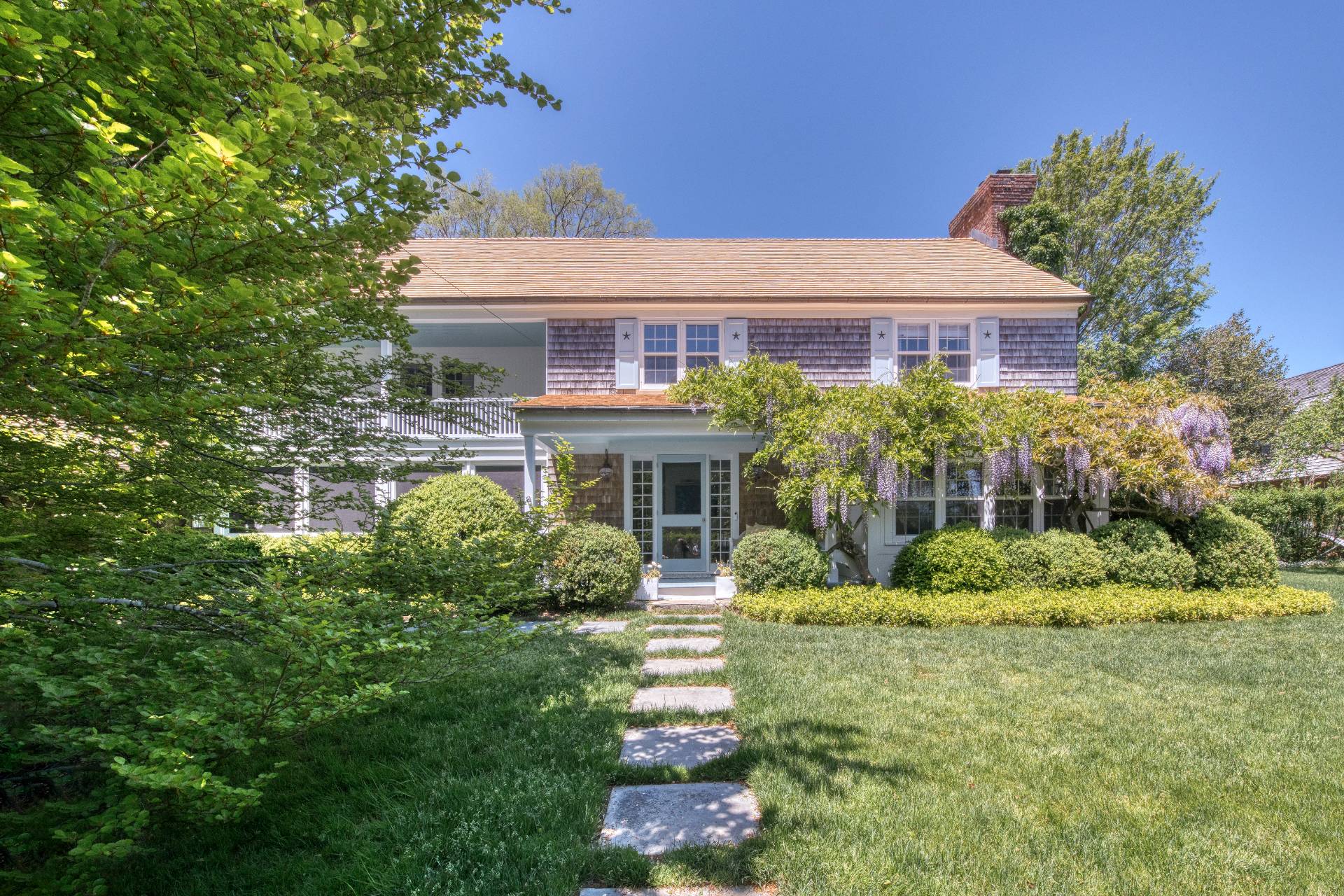 46 Westminster Road Water Mill, NY 11976 - Photo 4 of 28 a front view of a house with garden