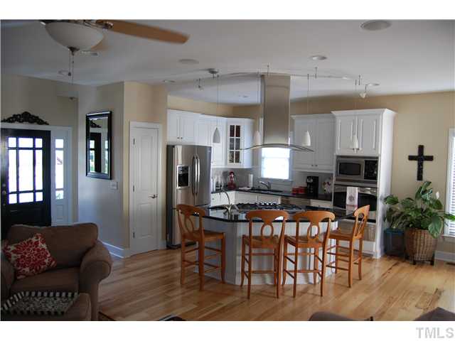 521 West Lenoir Street Raleigh, NC 27601 - Photo 2 of 4 GE Monogram and Profile appliances, center island with room for bar stools, under and over cabinet lighting, recessed lighting, space for kitchen table, granite countertops, and more!