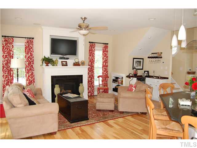 521 West Lenoir Street Raleigh, NC 27601 - Photo 4 of 4 Living room with wet bar and included wine cooler. Very open floor plan -- perfect for entertaining!