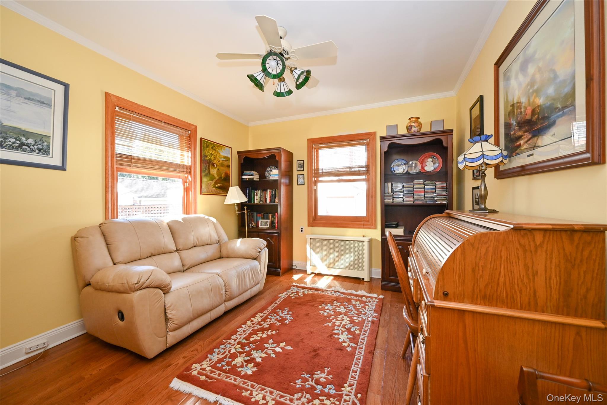 45-18 166th Street Queens, NY 11358 - Photo 11 of 20 a bedroom with furniture and a window