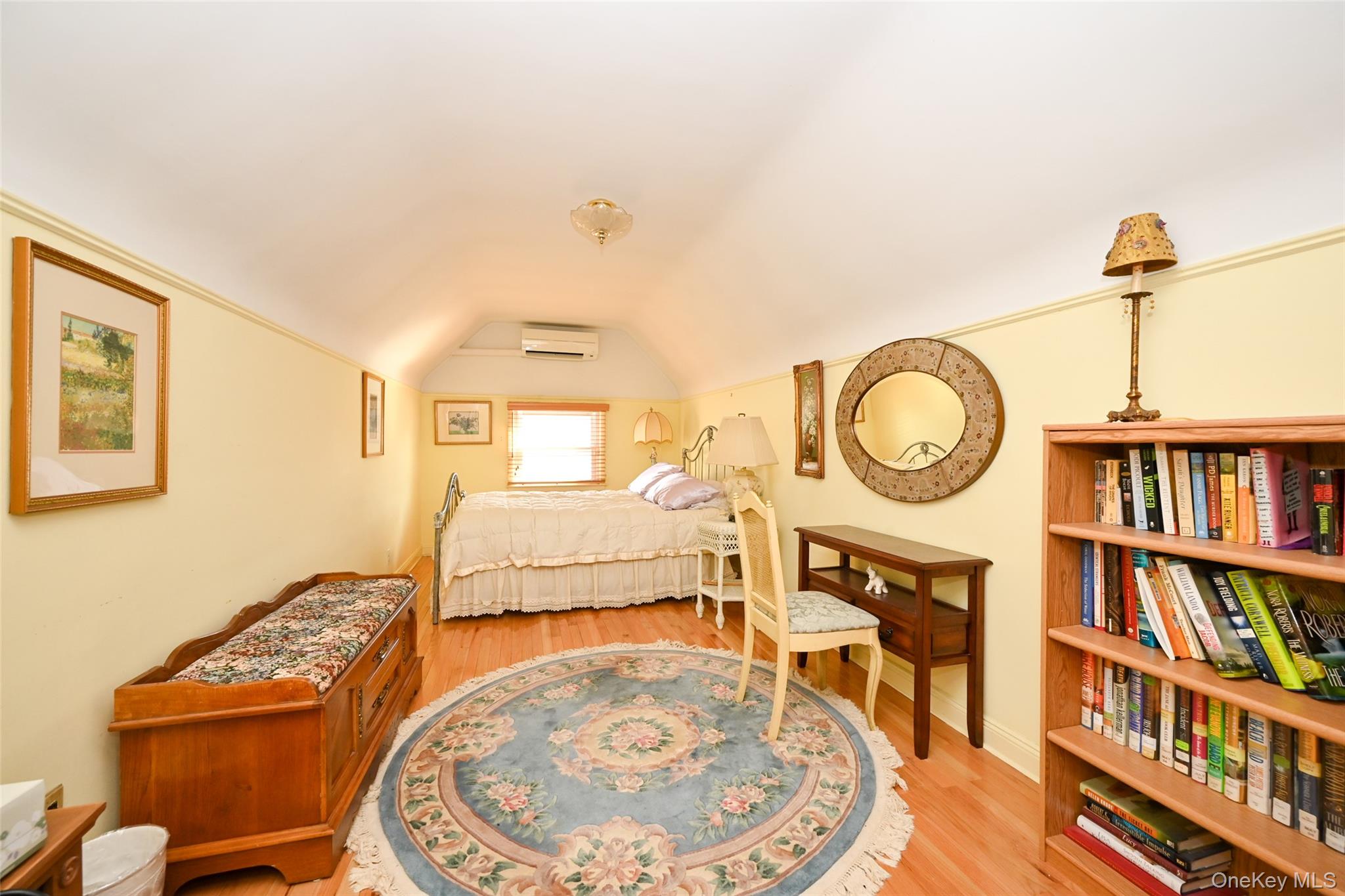 45-18 166th Street Queens, NY 11358 - Photo 14 of 20 a living room with fish tank and a bookshelf