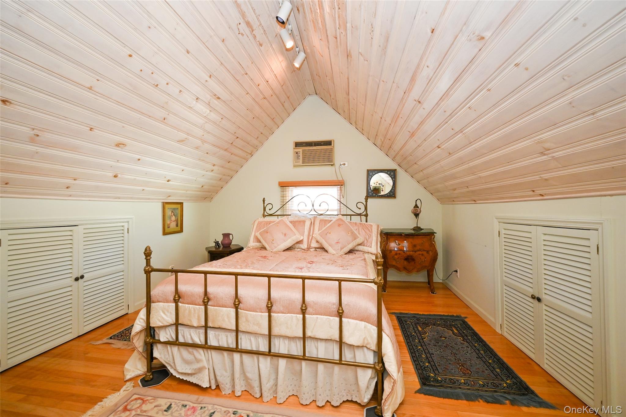 45-18 166th Street Queens, NY 11358 - Photo 15 of 20 a bedroom with a bed and a window