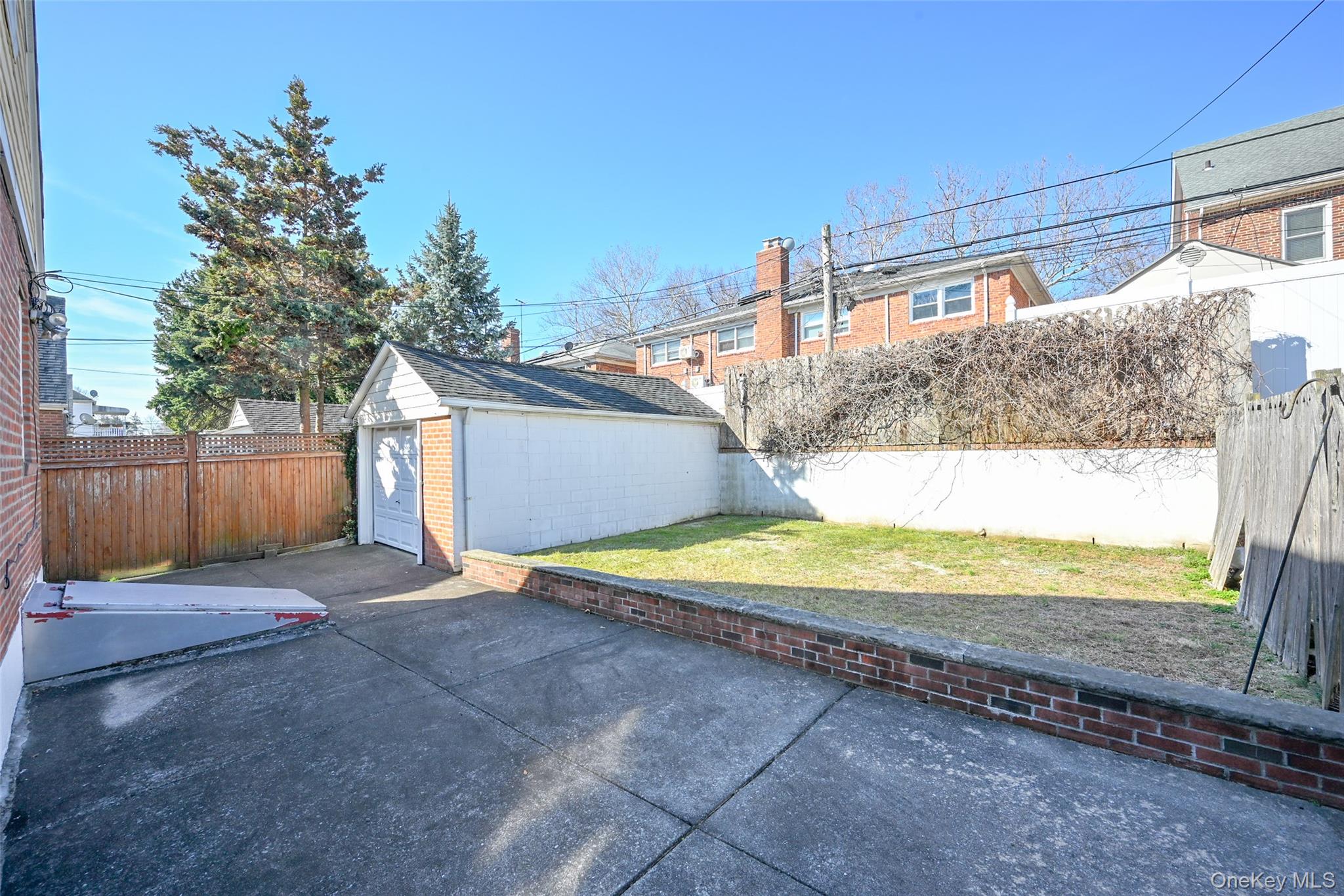 45-18 166th Street Queens, NY 11358 - Photo 18 of 20 a view of a backyard of the house