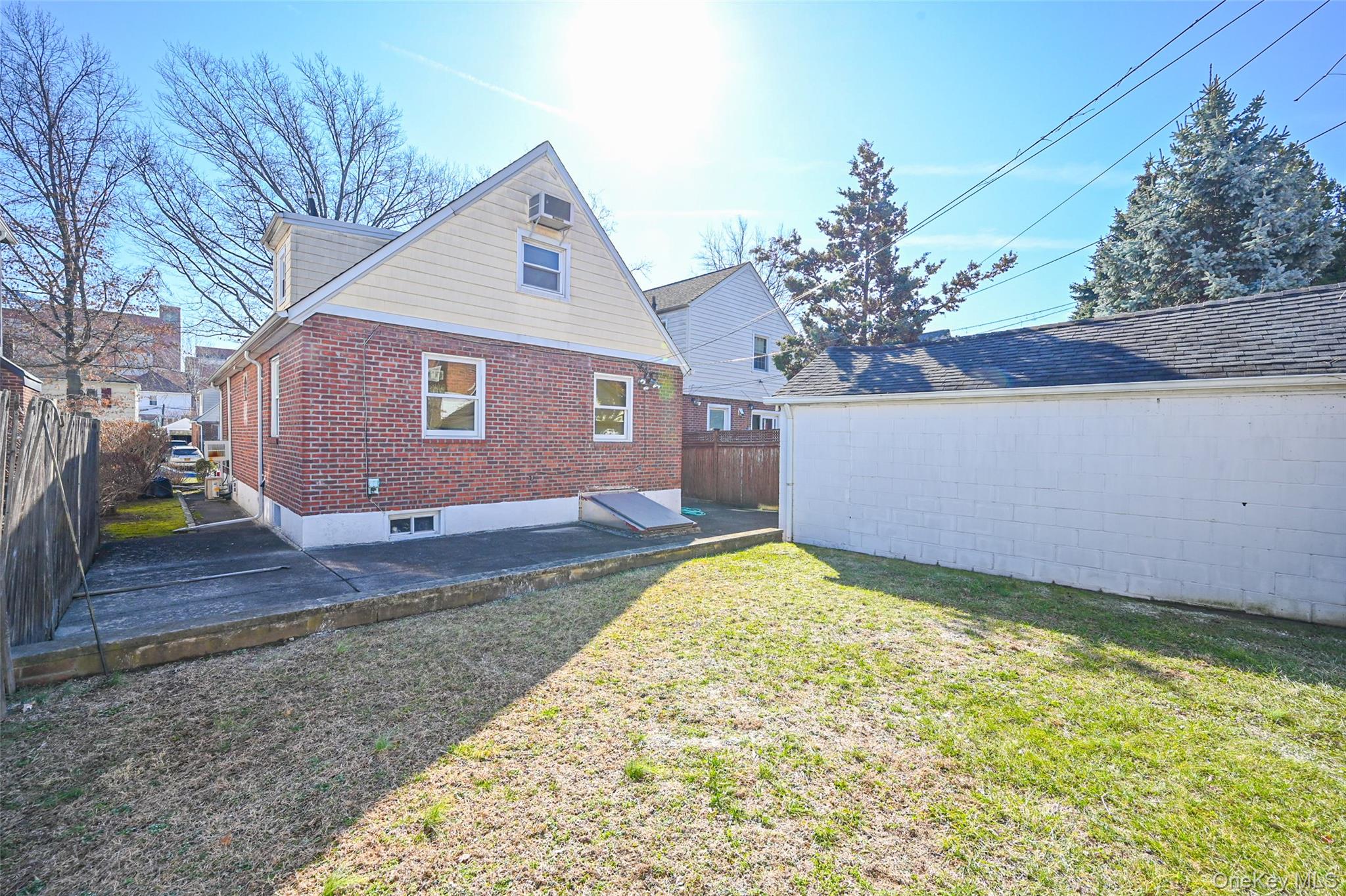 45-18 166th Street Queens, NY 11358 - Photo 20 of 20 a view of a house with a yard