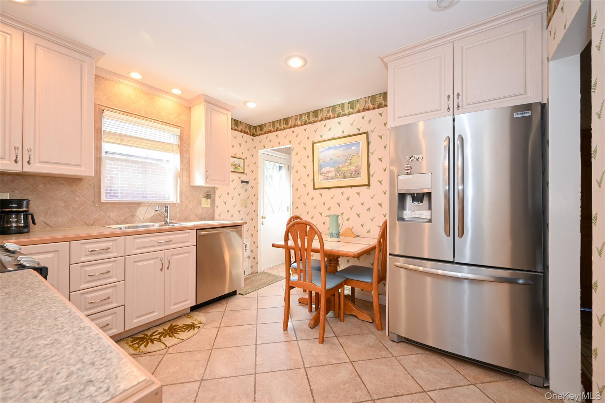 45-18 166th Street Queens, NY 11358 - Photo 3 of 20 a kitchen with appliances cabinets and furniture