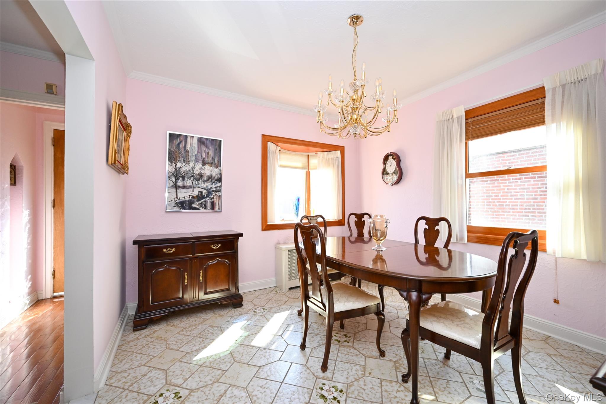 45-18 166th Street Queens, NY 11358 - Photo 7 of 20 a view of a dining room with furniture window and wooden floor