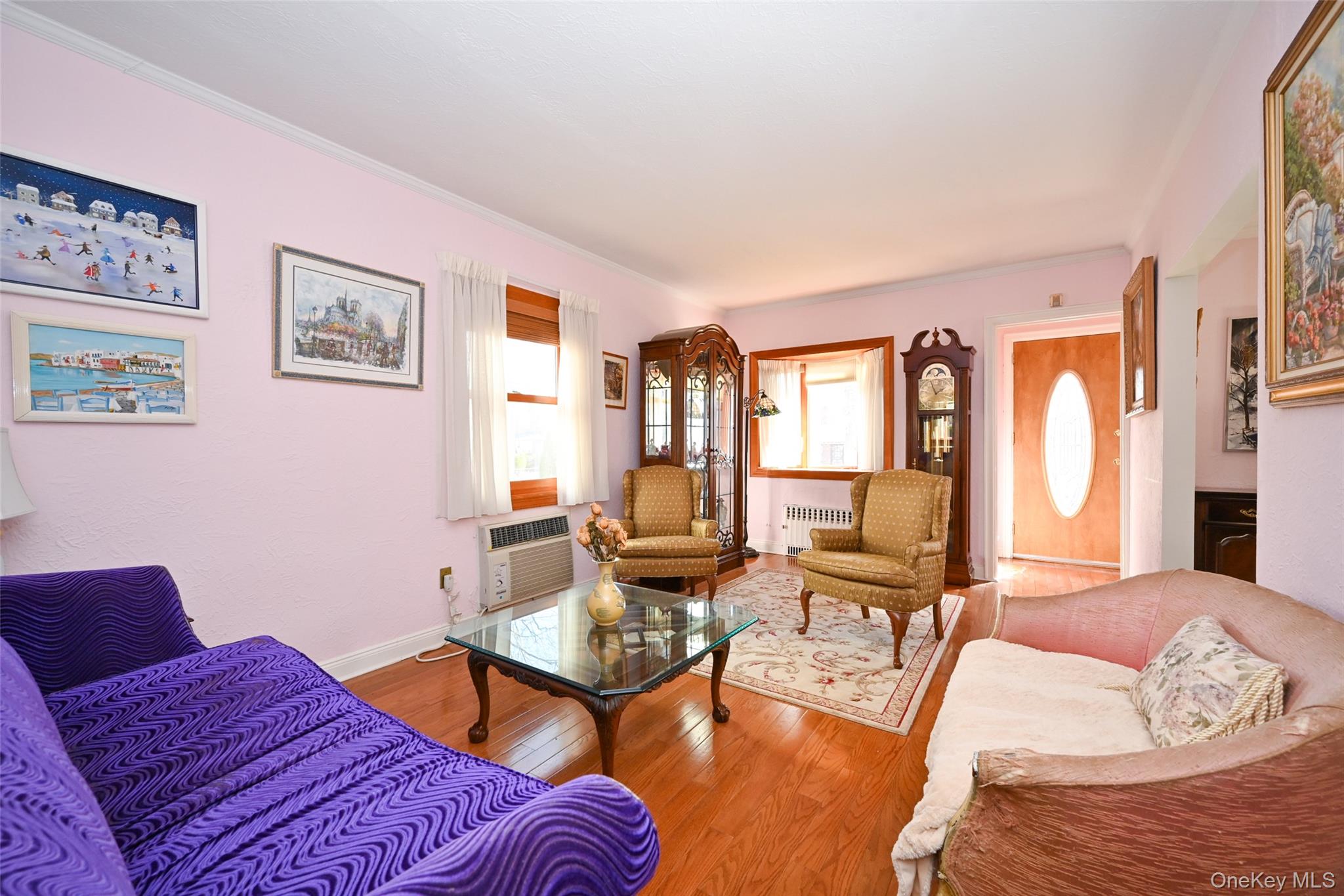 45-18 166th Street Queens, NY 11358 - Photo 8 of 20 a living room with furniture large window and wooden floor